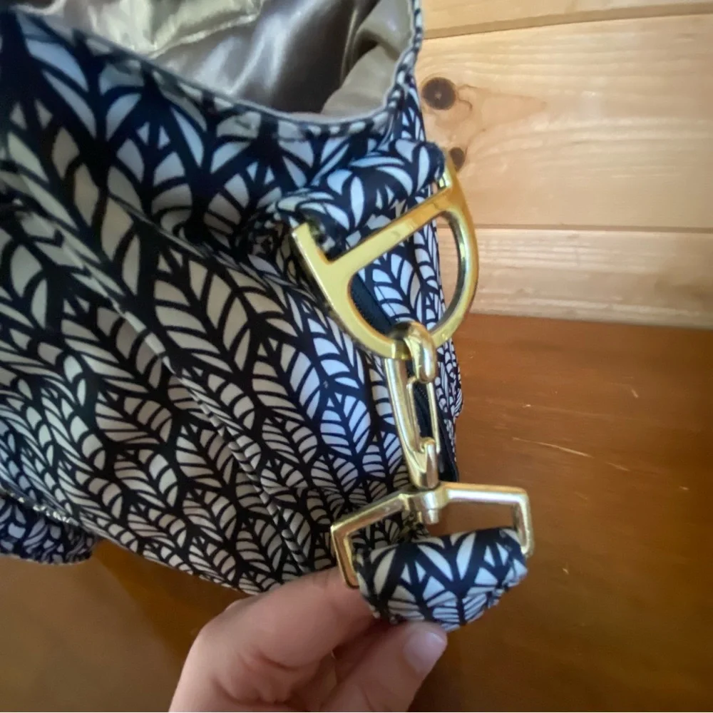Jujube Be Classy spacious diaper bag tote for travel with black and white design